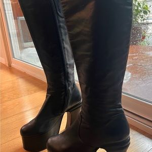 Vintage leather platform boots.  See pics for accurate size
